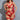 Front pose of woman in red lingerie outfit