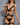 Sex doll in black lingerie with grey background.
