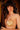 Woman wearing a gold bikini with a blurred background