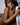Nude sex doll holding a white towel.