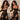 A collage of two images, the top one showing a woman with black hair and a lacey black dress, while the bottom one features a sex doll wearing a similar black dress. The doll has a realistic human appearance with detailed facial features and is seated in a similar elegant pose.