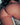 Close-up of a person's buttocks with a blurred background