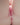 Close-up of a person's buttocks with a neutral background