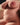Partial view of a nude person on a neutral background