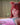 Person with fox ears and red hair sitting on a couch