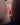 Close-up of a person's genital area with a dark background