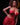 Model wearing a red mesh outfit with 'Ridmit' branding on a black background