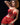 Model wearing a red crochet dress against a black background with 'Ridmii' branding.