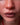 Close-up of a person's lips with 'Ridmii' branding.