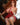 Sexy silicone sex doll sitting on a chair in red lingerie