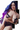A sex doll with blue hair sitting on a chair near a window in a violet lingerie.