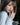 Woman holding a mug with a blurred background