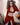 Person wearing a red outfit in an indoor setting