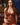 Sex doll in brown dress showing her underwear.