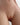 Partial view of a person's torso with a blurred background