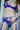 Person wearing blue lingerie with 'Victoria's Secret' branding.