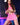 Figure in a pink outfit with fishnet stockings on a reflective surface.