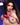 Artificial intelligence-generated image of a woman in a pink outfit with a blurred background