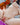 Partial nude image of a person with a blurred background