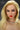Close up of A highly realistic beige sex doll with long blonde hair.