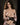 Silicone sex doll seated in elegant lingerie pose