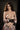 Silicone sex doll seated in elegant lingerie pose