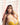 A beautiful doll wearing yellow bra and panty