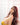 A beautiful doll wearing yellow bra