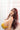 A beautiful doll wearing yellow bra