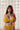 A beautiful doll wearing yellow bra and panty
