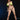 Model wearing a green bikini against a black background
