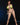 Model wearing a green bikini against a black background