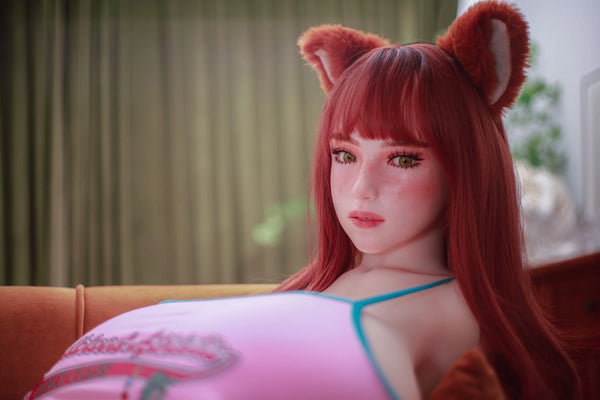 Person with fox ears and red hair sitting on a couch