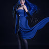 Person in a blue dress with long hair and black gloves against a dark background