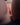 Close-up of a person's genital area with a dark background
