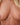 Partial frontal view of a person with blonde hair and visible skin texture.