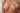 Partial frontal view of a person with blonde hair and visible skin texture.