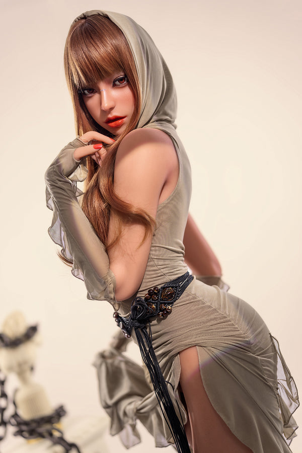 Woman in a beige dress with a headscarf and gloves against a neutral background