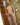Sex doll with blonde hair and red lipstick in a bathroom setting