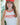 Person wearing a red cap and 'Boston 1998' tank top with blurred background