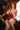 Sexy silicone sex doll sitting on a chair in red lingerie