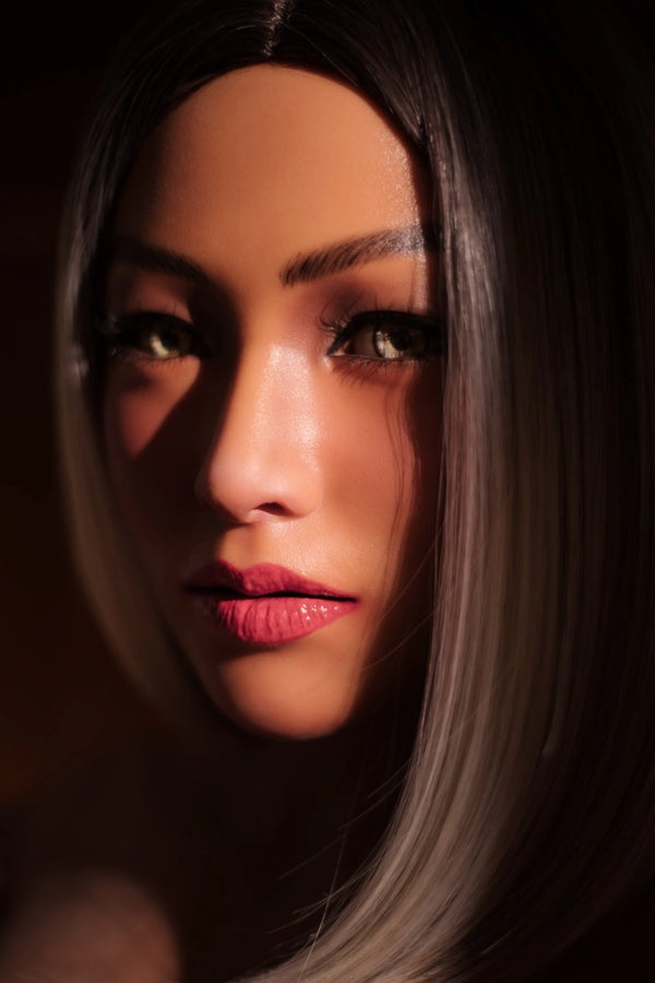 Close-up of a person with long hair and pink lipstick against a dark background