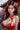 Woman in a traditional red and gold dress with a blurred background