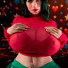 Person wearing a red top with sheer panels against a colorful background