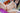 Partial nude image of a person with a blurred background