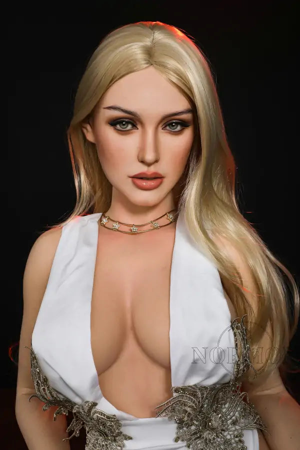 Person wearing a white and gold outfit with a black background