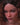 Video of woman standing in nude on a black background