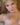 Sex doll in a golden hair touched by a man.